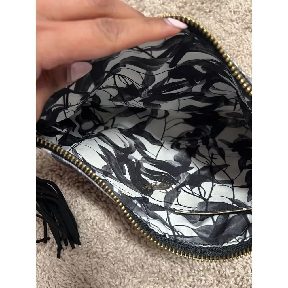 Saje Natural wellness clutch makeup cosmetic pouch bag